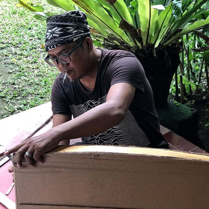 Arie making cardboard prototype of seat