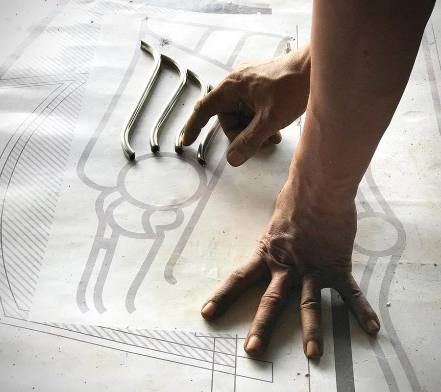 Laying out decorative steel tubing